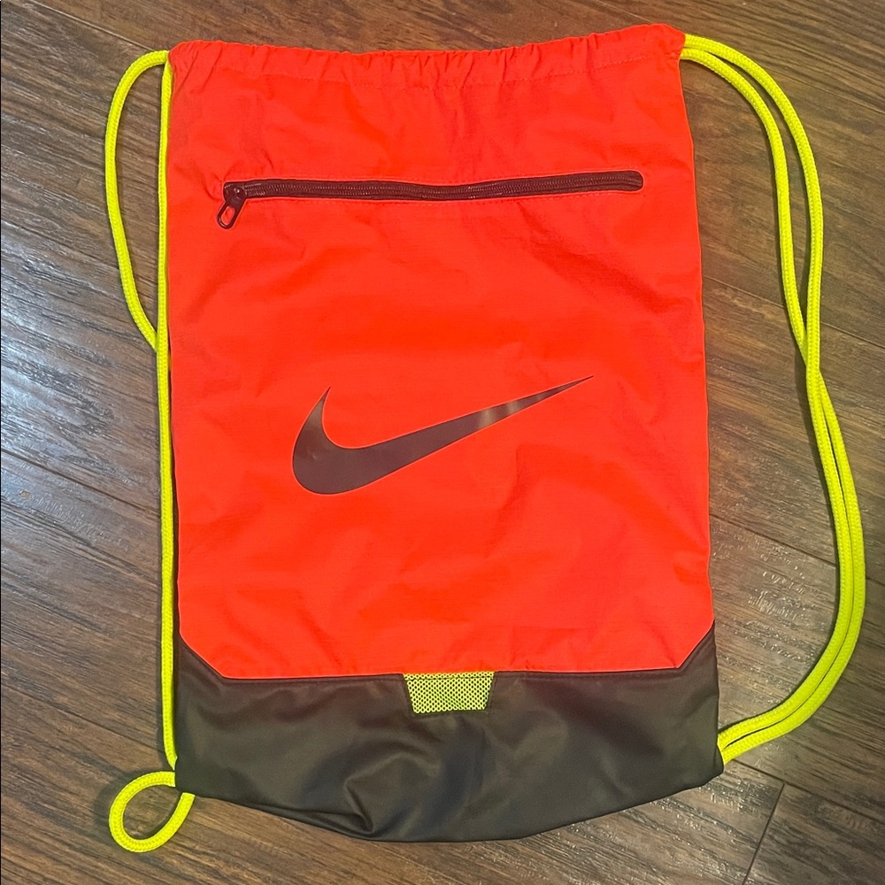 Nike Red and Black Drawstring Backpack with Yellow Accents